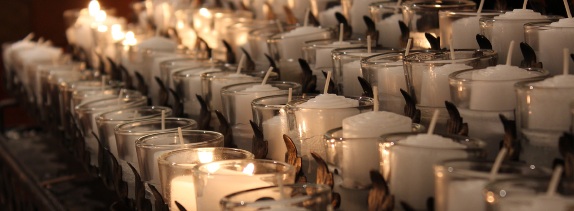 rows of votive candles